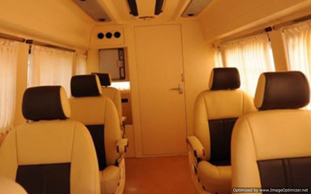 luxury tempo traveller with toilet