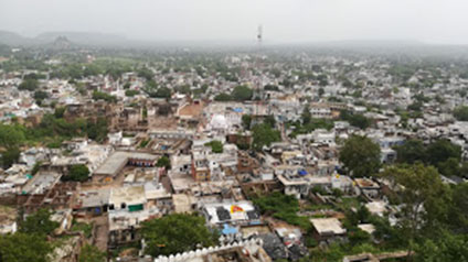 9 seater tempo traveller hire in Chanderi Fort