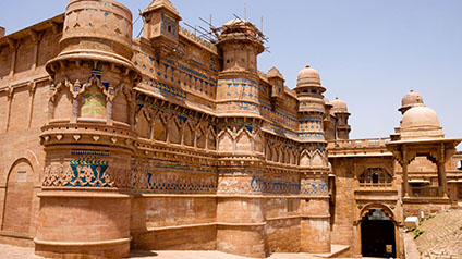 9 seater tempo traveller hire in Man Singh Palace