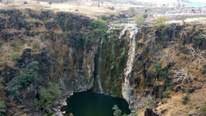 9 seater tempo traveller hire in Patalpani Waterfall
