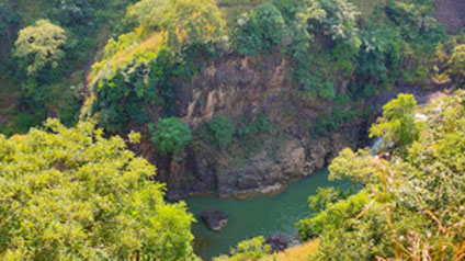9 seater tempo traveller hire in Patalpani Waterfall
